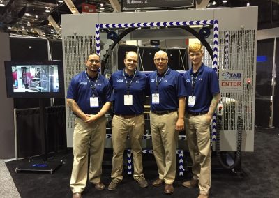 Tab Wrapper Tornado Team Members at a Trade Show