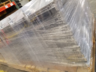 Metal parts stretch wrapped on pallet by TAB Wrapper Tornado at MOnti