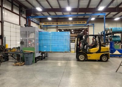 Forklift driver using TAB Wrapper Tornado orbital wrapper to stretch wrap pallet load at Penn Sheet Metal, Allentown, PA