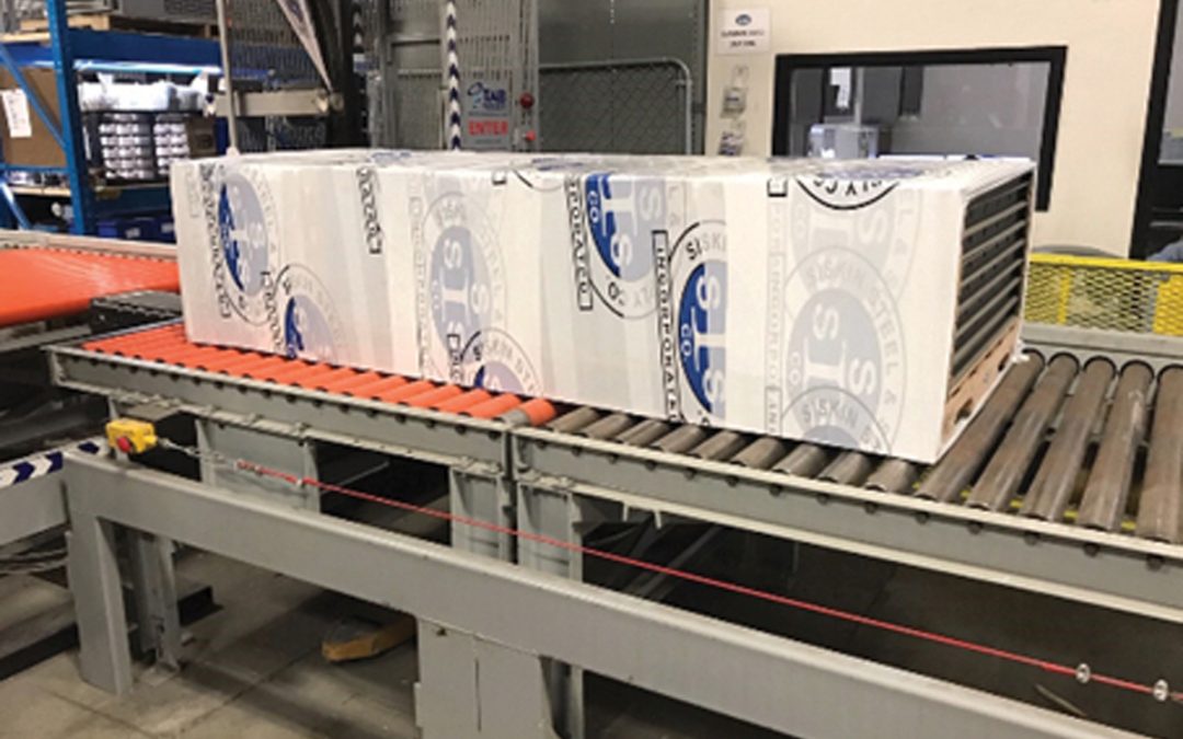 TAB custom branded stretch wrap on roller conveyor TAB Wrapper Tornado