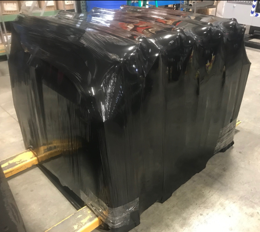 Pallet Load Wrapped in Black Stretch Wrap by TAB Wrapper Tornado